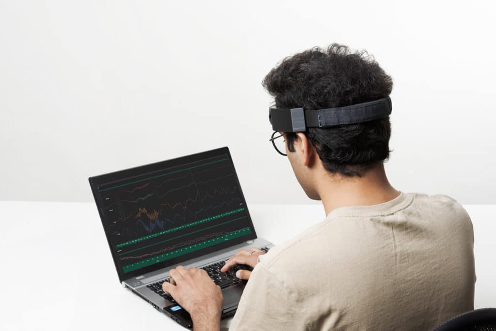 Brain-computer interface - what opportunities will the technology provide for people and businesses? - BrainAccess Brain-computer interface solution taking place on laptop